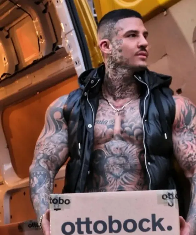 Tattooed delivery male entertainer